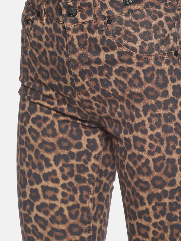 High Waisted Jeans With Leopard Print All Over And Distress Cut On One Knee